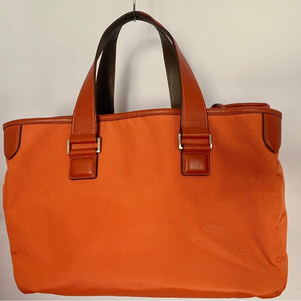 Tumi Handbag, luscious rich orange for fall, perfect condition inside & out.